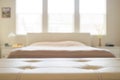 White leather empty bench in front of blurred bedroom Royalty Free Stock Photo
