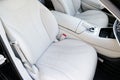 White leather interior of the luxury modern car. Leather comfortWhite leather interior of the luxury modern car. Leather Royalty Free Stock Photo