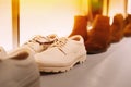 white leather male shoes on shelf display in shop mall store. Store Of Shopping Center. retail sale Royalty Free Stock Photo