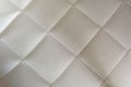 White leather texture background with rhomboid stitching