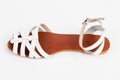 White leather women`s sandals with low heels Royalty Free Stock Photo