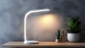 White LED Desk Lamp with Rounded Base and Light Strip Royalty Free Stock Photo