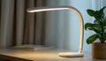 White LED Desk Lamp with Rounded Base and Light Strip Royalty Free Stock Photo