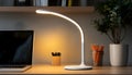 White LED Desk Lamp with Rounded Base and Light Strip Royalty Free Stock Photo