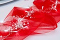 Led lights on red drapery as Christmas table decoration Royalty Free Stock Photo