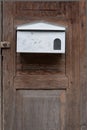 White Letterbox on Old Wood