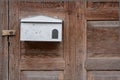 White Letterbox on Old Wood