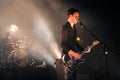 White Lies , The singer and guitarist Harry McVeigh during the concert Royalty Free Stock Photo
