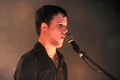 White Lies , The singer and guitarist Harry McVeigh during the concert Royalty Free Stock Photo