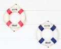 White Life buoy with welcome aboard on white wall Royalty Free Stock Photo