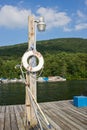 White Life Raft On Boat Dock