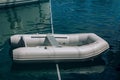 White lifeboat on a calm sea bay surface Royalty Free Stock Photo