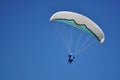 White and light blue paraglide in the sky Royalty Free Stock Photo