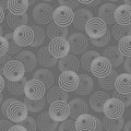 Concentric circles with dotted outline in two colors. Seamless geometric pattern on dark gray background. Vector colorless image Royalty Free Stock Photo
