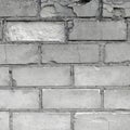 White light grey old aged weathered fine brick wall texture, grungy damaged calcium silicate bricks pattern detail background Royalty Free Stock Photo