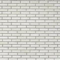 White light grey taupe old aged weathered fine brick wall texture pattern background closeup, large detailed textured horizontal Royalty Free Stock Photo