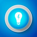White Light lamp sign. Bulb with lightning symbol icon isolated on blue background. Idea symbol. Circle blue button with Royalty Free Stock Photo