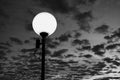 White light post be showing with a beautiful cloudy sky at a sunset [Black and White version] Royalty Free Stock Photo