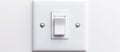 A white light switch on a wall Royalty Free Stock Photo