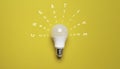 White lightbulb with on yellow background for creative thinking idea for patent and problem solving innovation concept Royalty Free Stock Photo