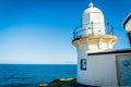 White lighthouse above the sea in Port Macquarie, New South Wales, Australia