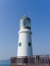 White lighthouse in Busan on a sunny day