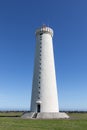 White lighthouse on the coast of Iceland. Royalty Free Stock Photo