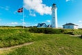 White lighthouse in nature, landscape of Denmark