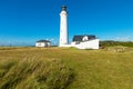 White lighthouse in nature, landscape of Denmark
