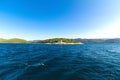 White lighthouse on a small Croatian island Royalty Free Stock Photo