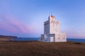 White lighthouse at south iceland coast dyrholaey