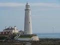 White lighthouse stands proudly on the waterfront in Newcastle, United Kingdom