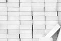 White lightweight concrete block placed over a layer concrete wall used for construction and interior design Royalty Free Stock Photo