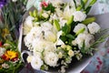 White lilies and carnations. top view of bouquets of fresh flowers