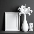 White Lily in Vase with Empty Picture Frame and Human Head Sculpture empty frame Royalty Free Stock Photo