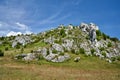 white, Limestone rocks on top of a hill on a clear day Royalty Free Stock Photo