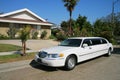 White limousine at driveway