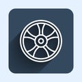 White line Alloy wheel for car icon isolated with long shadow background. Blue square button. Vector Royalty Free Stock Photo