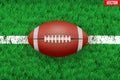 White line and american football ball on Sport grass field