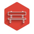 White line Bench icon isolated with long shadow. Red hexagon button. Vector Illustration.