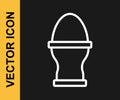 White line Chicken egg on a stand icon isolated on black background. Vector