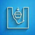White line Coffin in grave icon isolated on blue background. Funeral ceremony. Long shadow. Vector