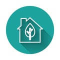 White line Eco friendly house icon isolated with long shadow. Eco house with leaf. Green circle button. Vector Royalty Free Stock Photo