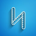 White line Folding ruler icon isolated on blue background. Long shadow