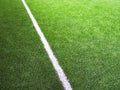 white line on green grass of futsal field or football field Royalty Free Stock Photo