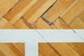 White line in hall . Worn out wooden floor of sports hall with colorful marking lines Royalty Free Stock Photo