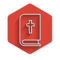 White line Holy bible book icon isolated with long shadow. Red hexagon button. Vector Illustration.