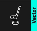 White line Ice hockey stick and puck icon isolated on black background. Vector Royalty Free Stock Photo