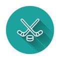 White line Ice hockey sticks and puck icon isolated with long shadow. Game start. Green circle button. Vector