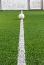 White line on indoor soccer field with football on the playground is ready for kick off as tournament or training Royalty Free Stock Photo